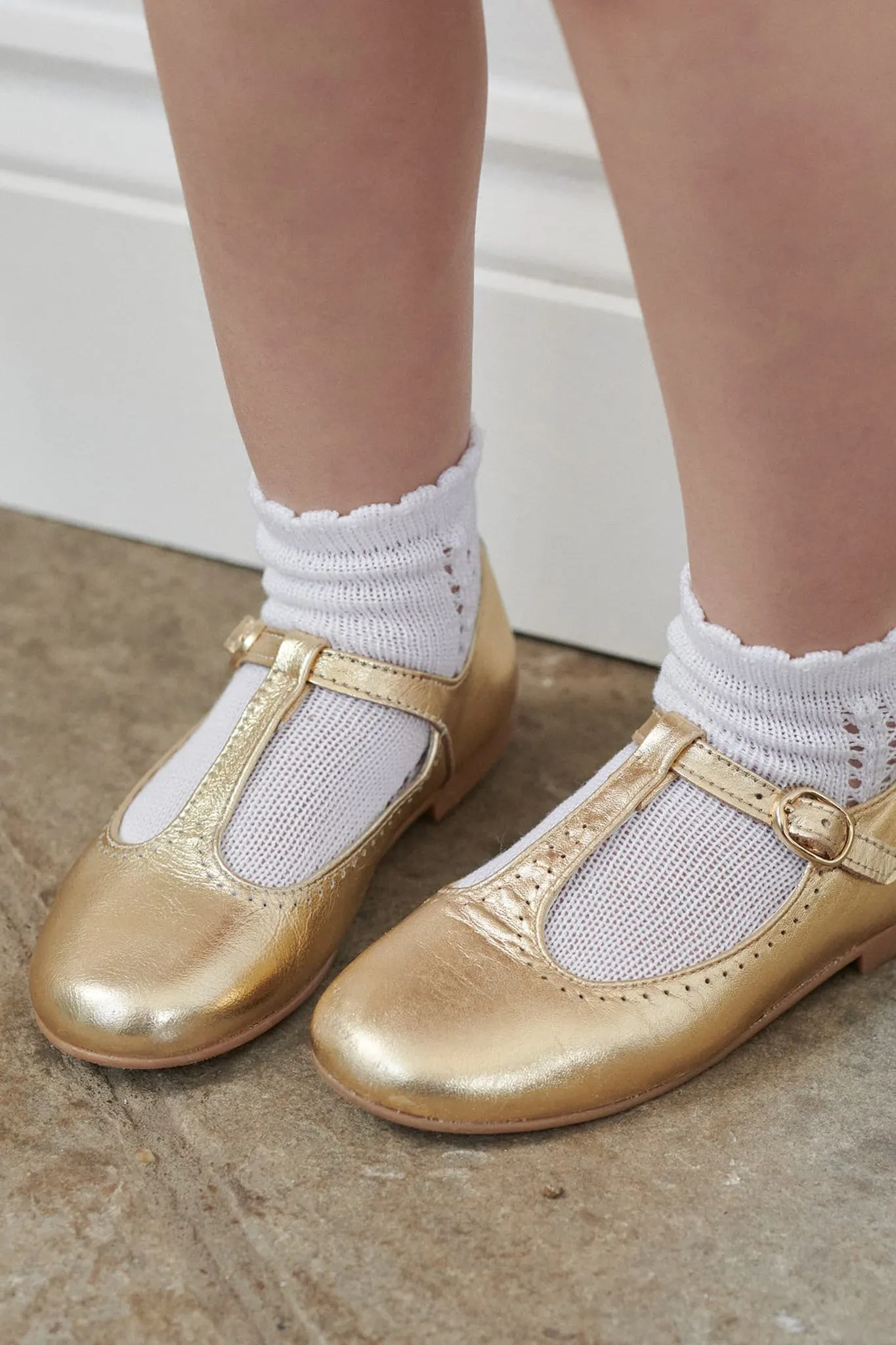 Gold Leather T Bar Shoes sold by Tuckernuck