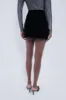 Black Velvet Opal Mini Skirt sold by Tuckernuck