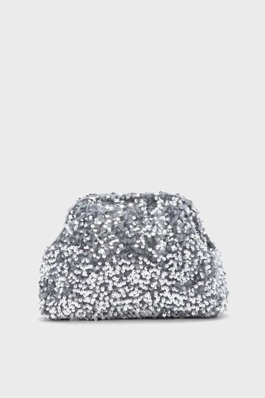 Silver Sparkle Clutch sold by Tuckernuck