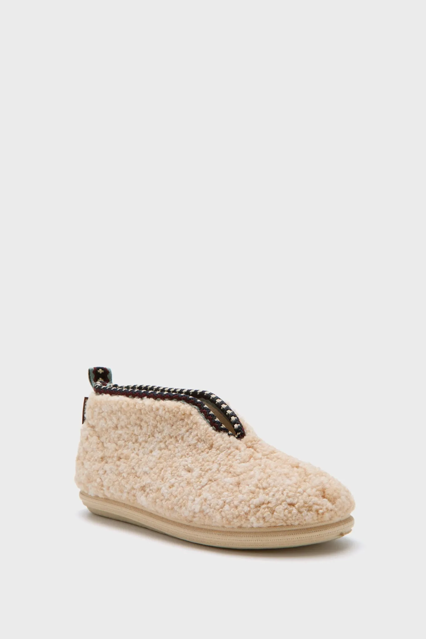 Ivory Puck Fleece Slippers sold by Tuckernuck