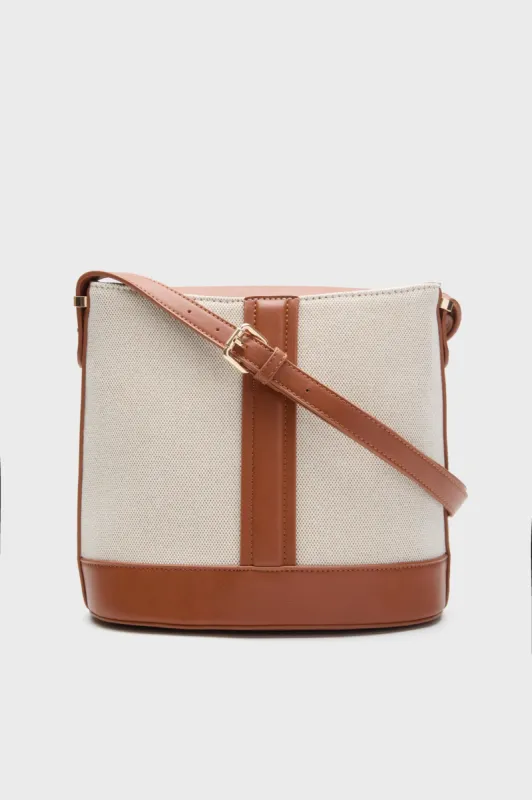 Tan Urbana Bag sold by Tuckernuck