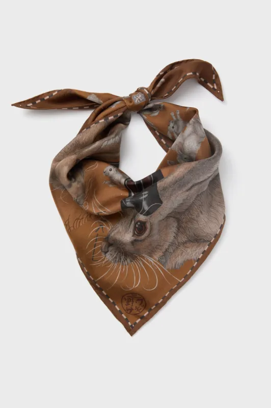 The Floating Rabbits Cinnamon Triangle Scarf made by Tuckernuck