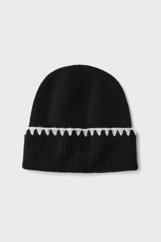 Black Blanket Stitch Winter Hat sold by Tuckernuck