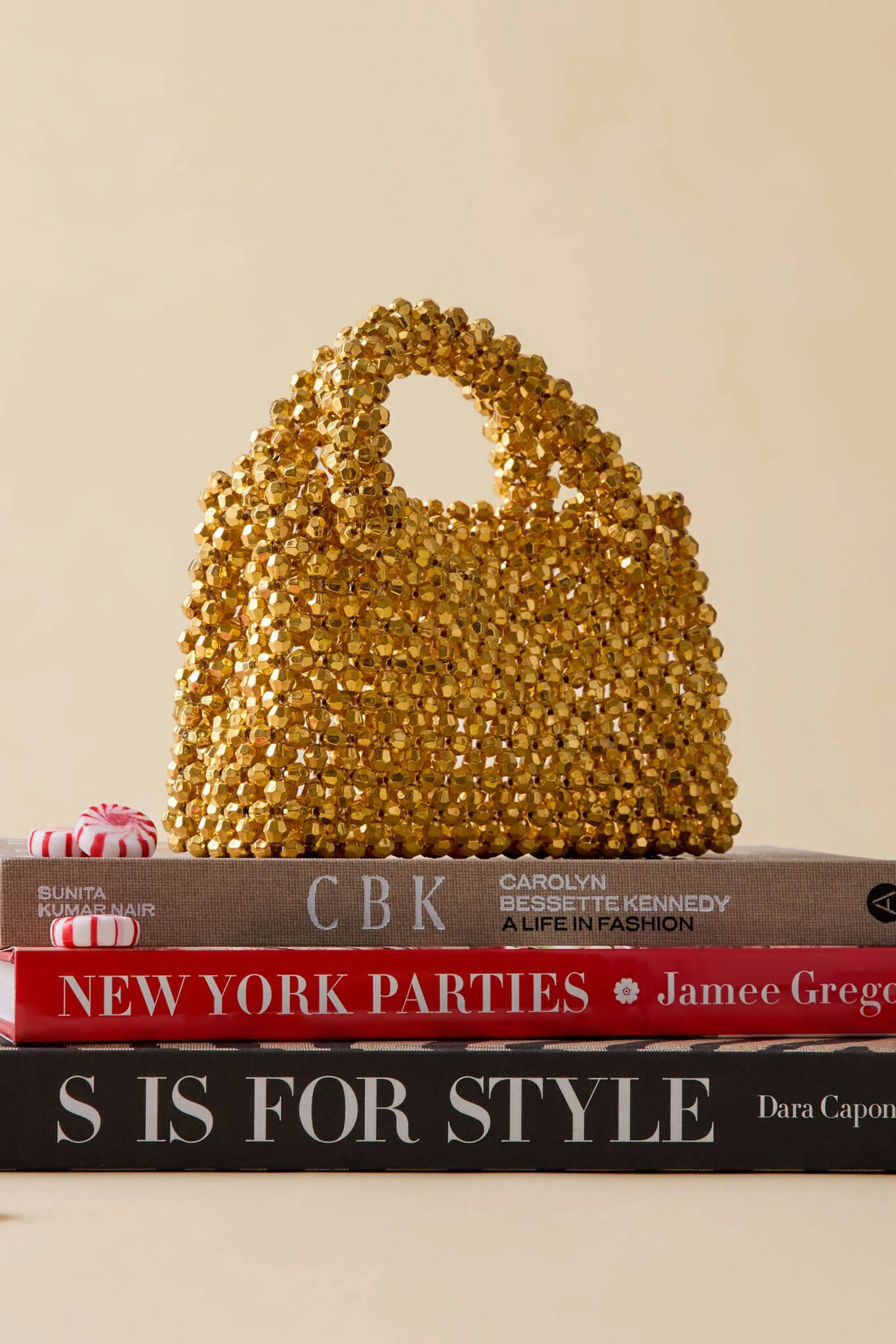 Gold Kora Bag sold by Tuckernuck