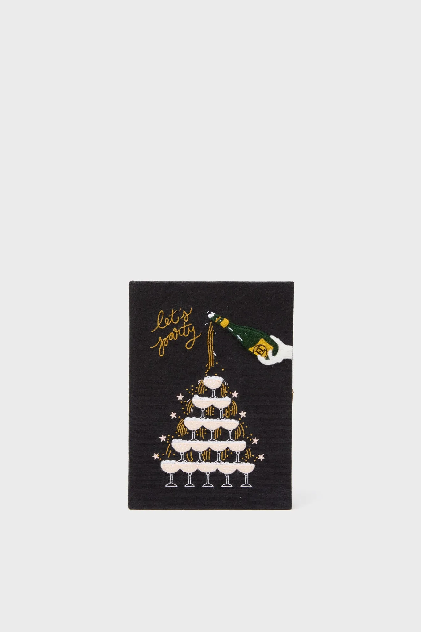 Let's Party Book Clutch sold by Tuckernuck
