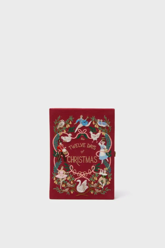 The Twelve Days of Christmas Book Clutch sold by Tuckernuck