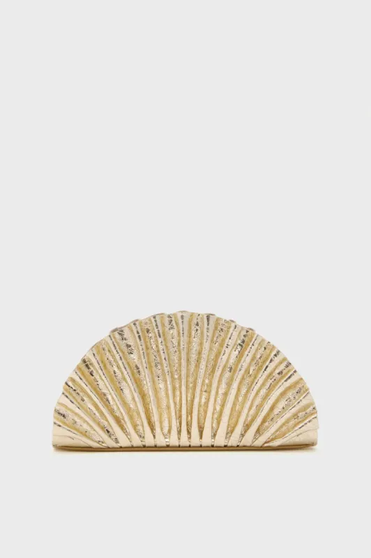 Bright Brass Mini Nala Clutch sold by Tuckernuck