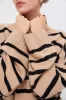 Soft Taupe and Black Oversized Funnel Neck Sweater sold by Tuckernuck
