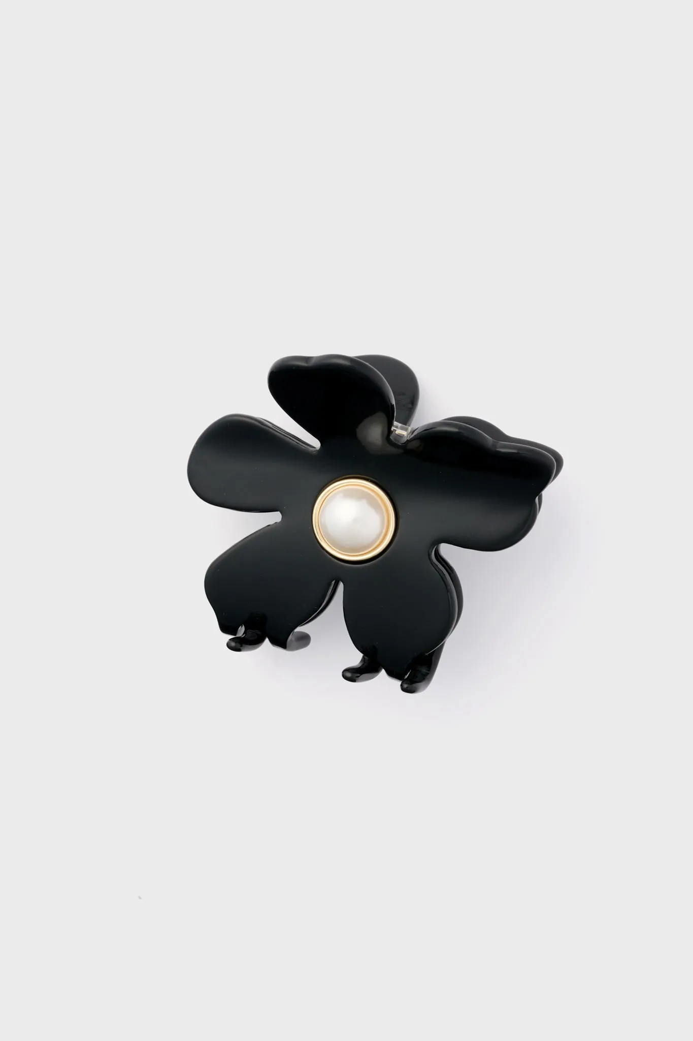 Jet Pearl Lily Claw Clip sold by Tuckernuck
