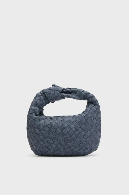 Dark Denim Tracy Bag sold by Tuckernuck