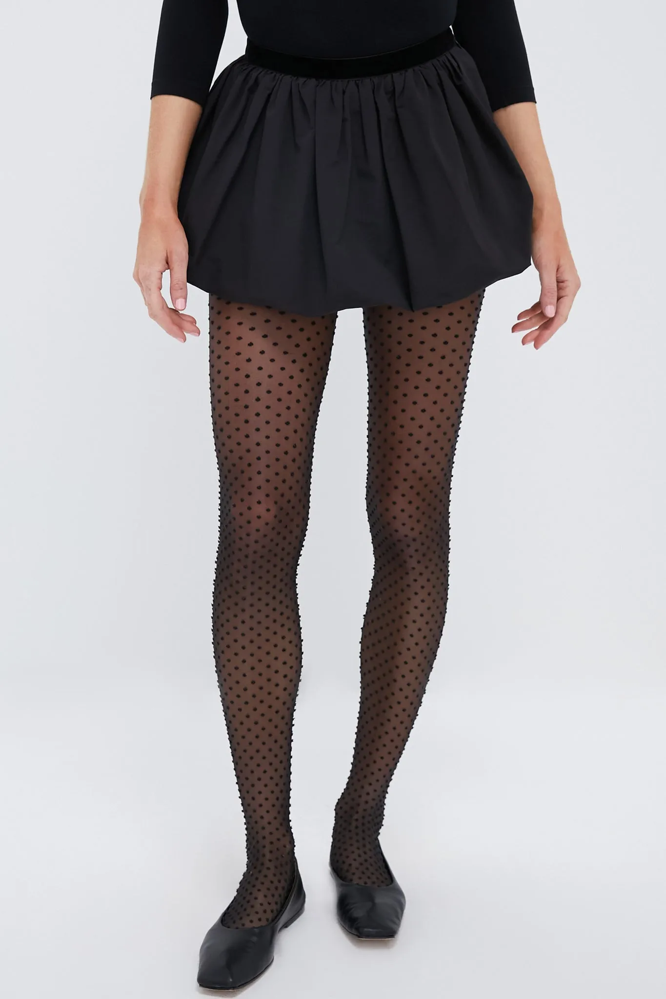 Black Antonia Skirt sold by Tuckernuck