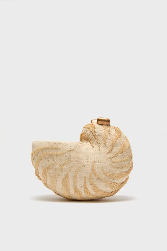 Sand Anna Conch Clutch sold by Tuckernuck