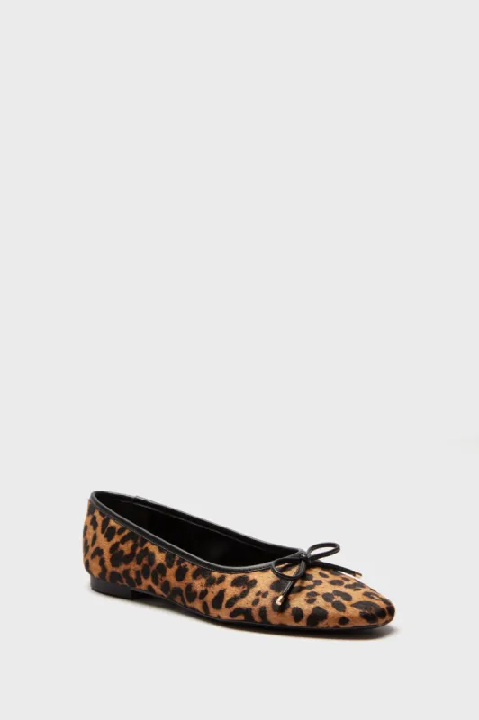 Natural and Black Arissa Flats sold by Tuckernuck