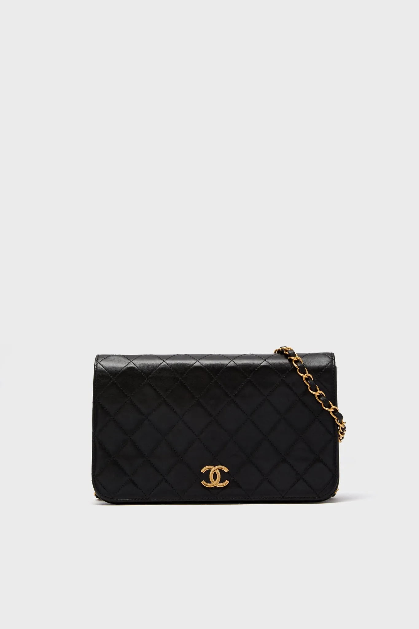 CHANEL Black Medium Vintage Quilted Lambskin Full Flap Bag sold by Tuckernuck