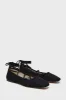 Black Louisa Flats sold by Tuckernuck