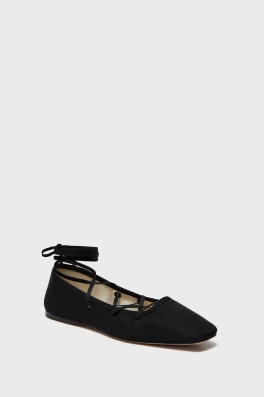 Black Louisa Flats sold by Tuckernuck