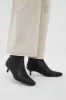 Black Marcella Ankle Boots sold by Tuckernuck