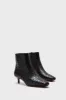 Black Marcella Ankle Boots sold by Tuckernuck