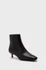 Black Marcella Ankle Boots sold by Tuckernuck