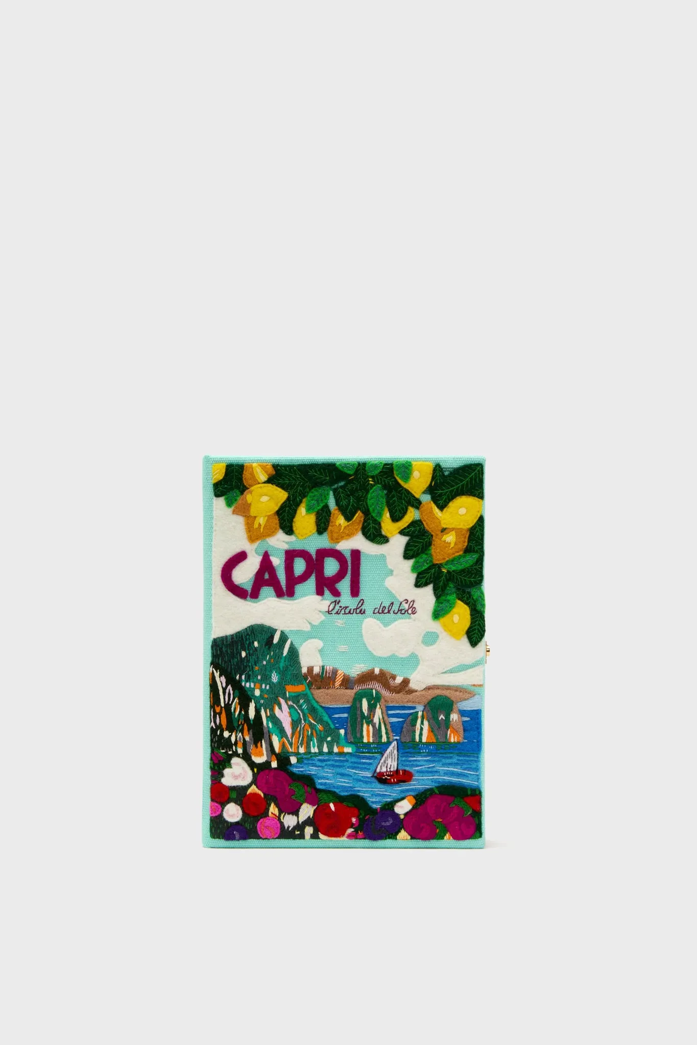 Capri Book Clutch sold by Tuckernuck