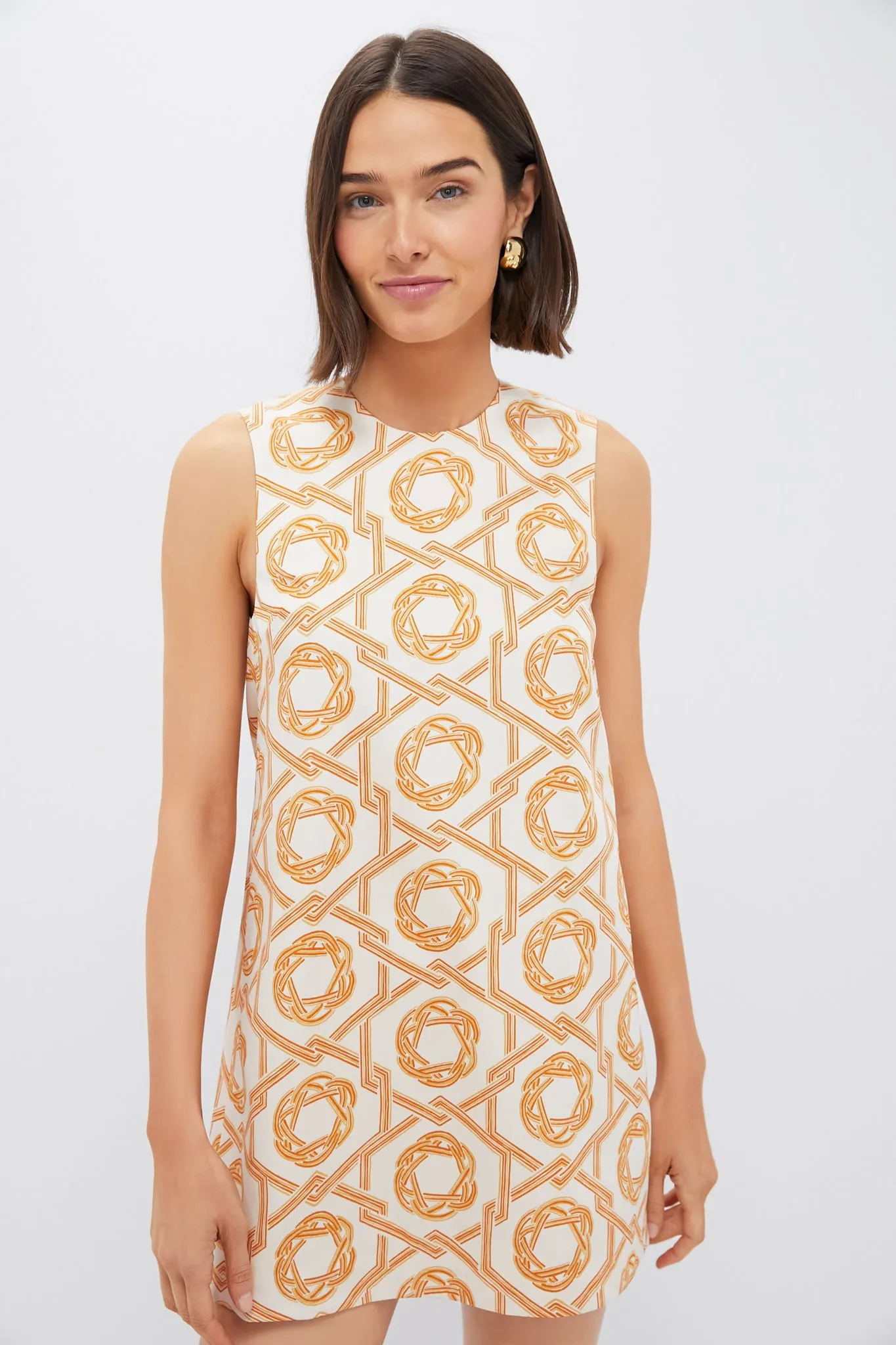 Ivory and Orange Anicka Mini Dress sold by Tuckernuck