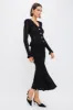 Black Knit Peplum Midi Dress sold by Tuckernuck