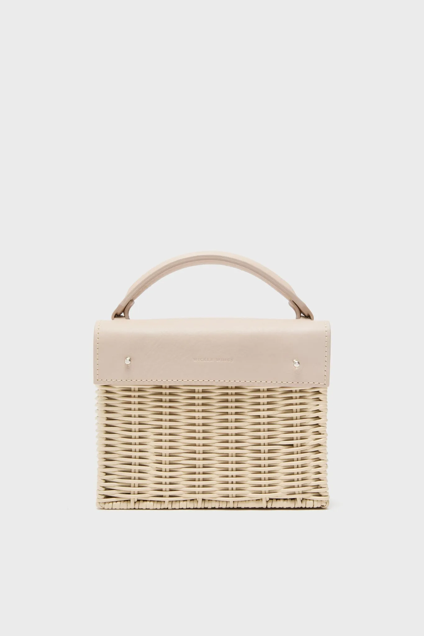 Cream and Natural Kuai Bag sold by Tuckernuck