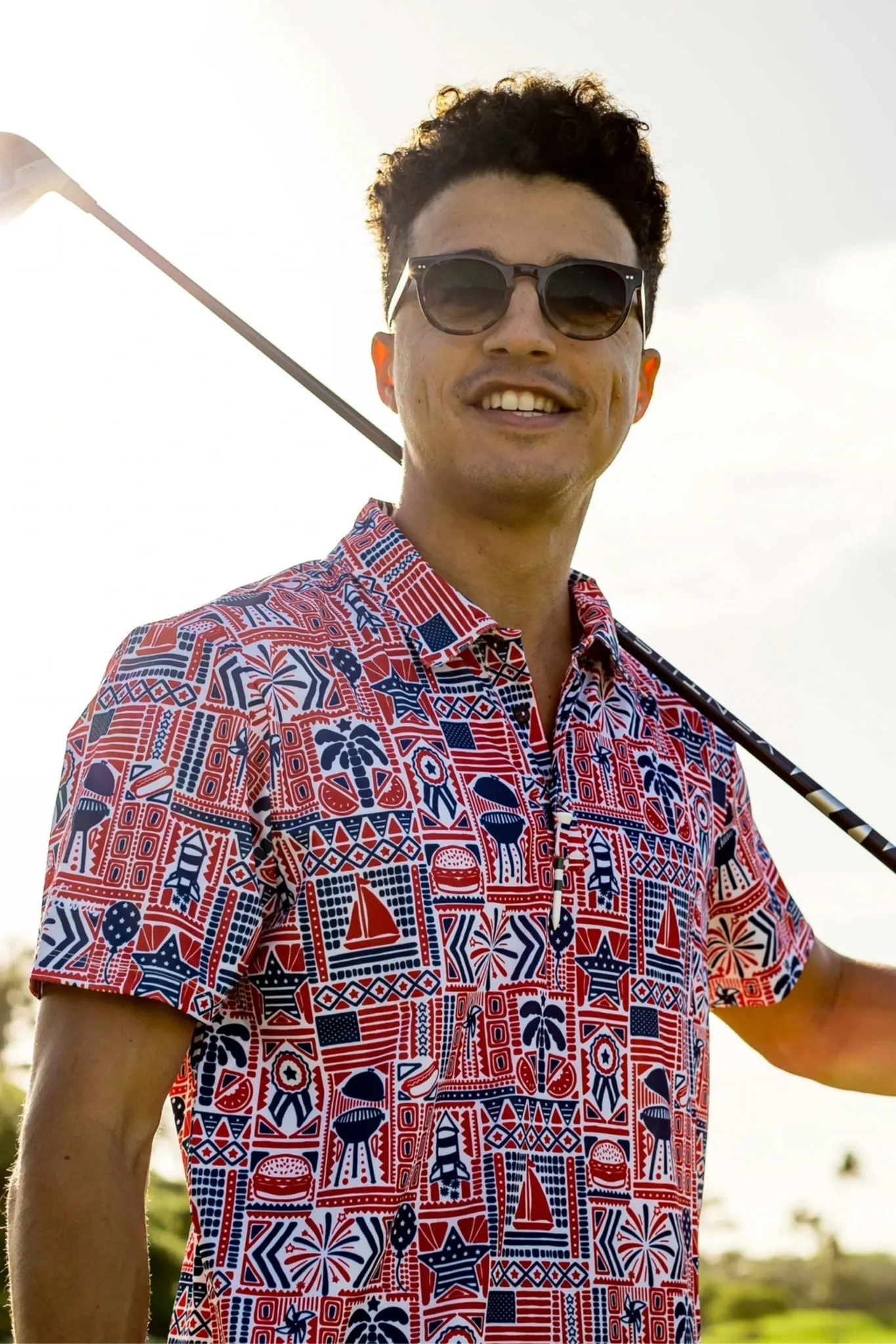 The American Boy Golf Shirt sold by Tuckernuck