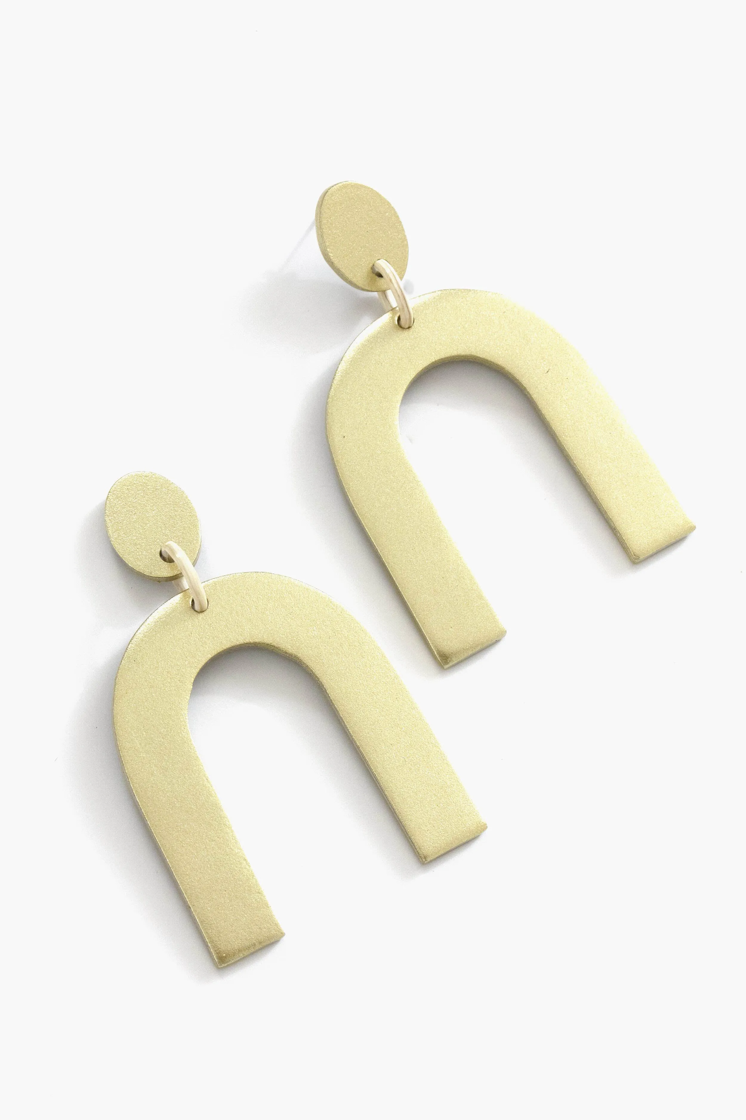 Exclusive Gold Metallic Horseshoe Earrings sold by Tuckernuck