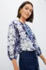 Indigo Reflection Kennedi Tie Blouse sold by Tuckernuck