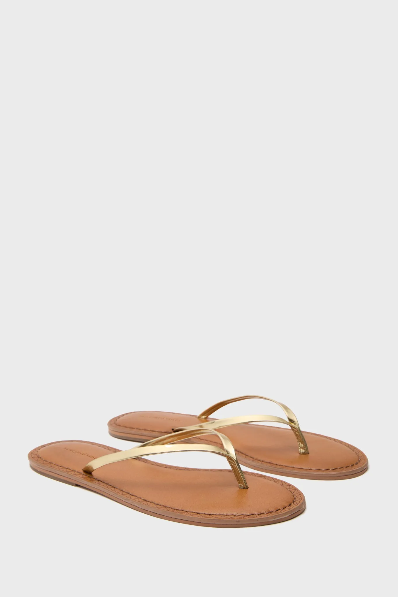 Gold Skinny Strap Flip Flops sold by Tuckernuck product image thumbnail 4