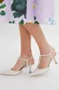 White Nappa Leather Margot Heels sold by Tuckernuck