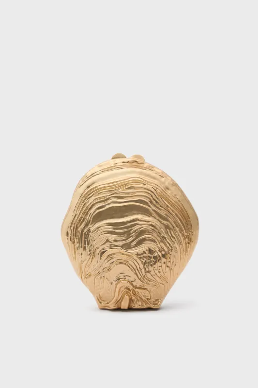 Gold Cove Shell Clutch sold by Tuckernuck