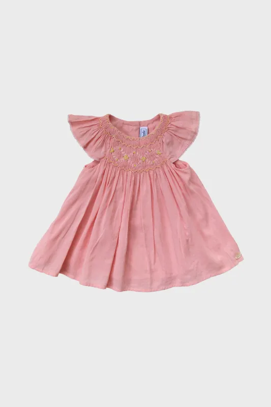 Pink Smocked Flutter Sleeve Dress sold by Tuckernuck