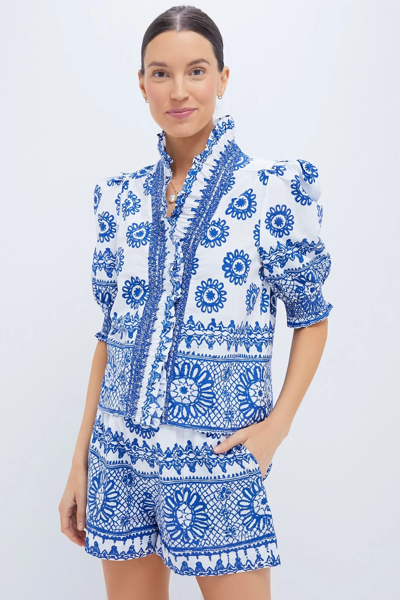 Exclusive White and Blue Zuri Top sold by Tuckernuck