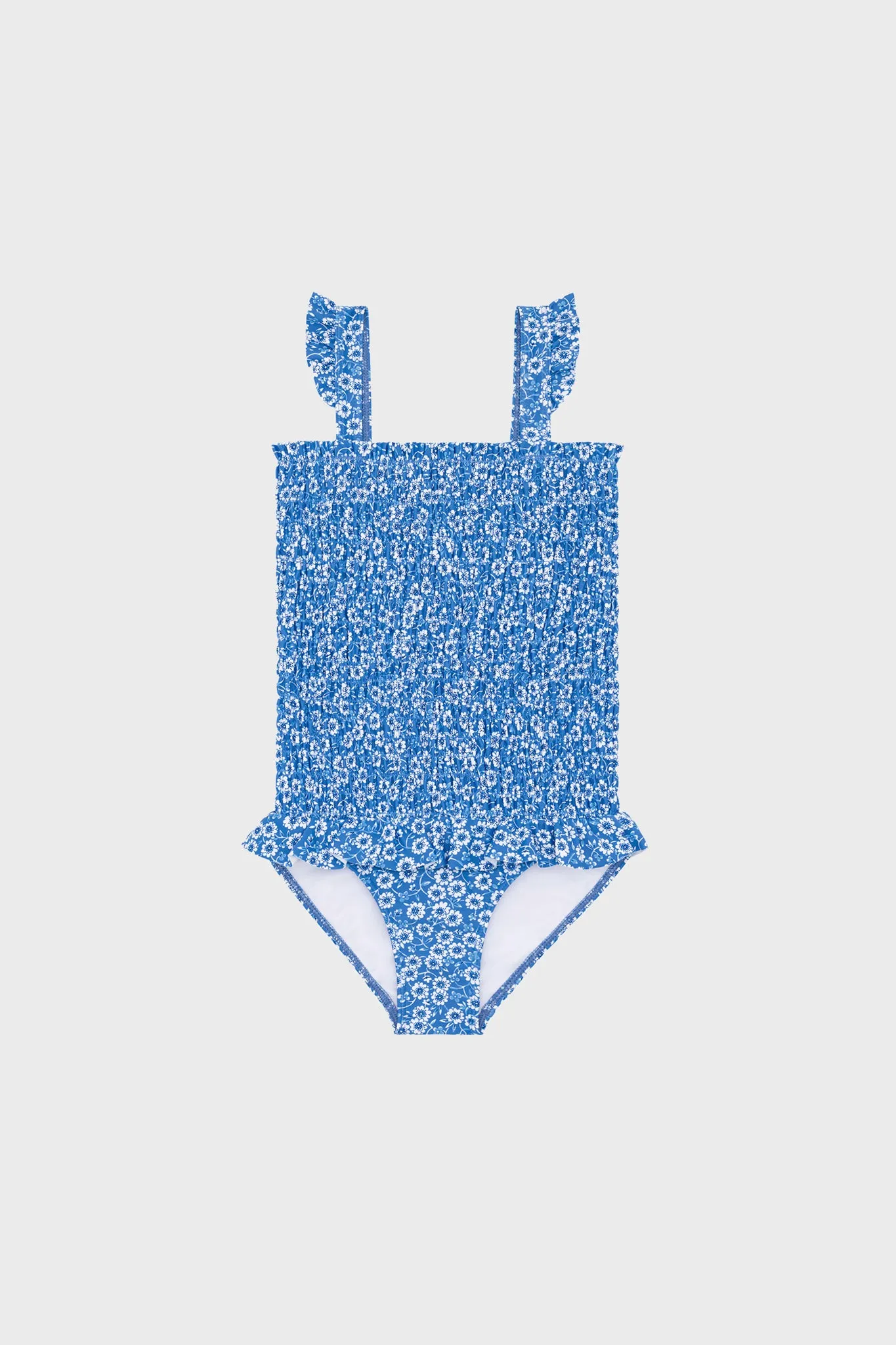 Blue Floral Smocked One Piece with Ruffle Skirt sold by Tuckernuck