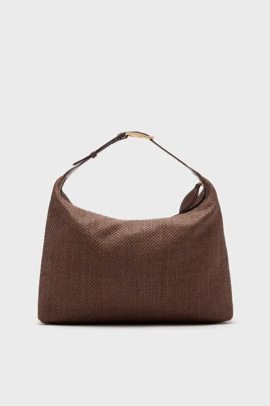 Brown Raffia Pillow Shoulder Bag sold by Tuckernuck