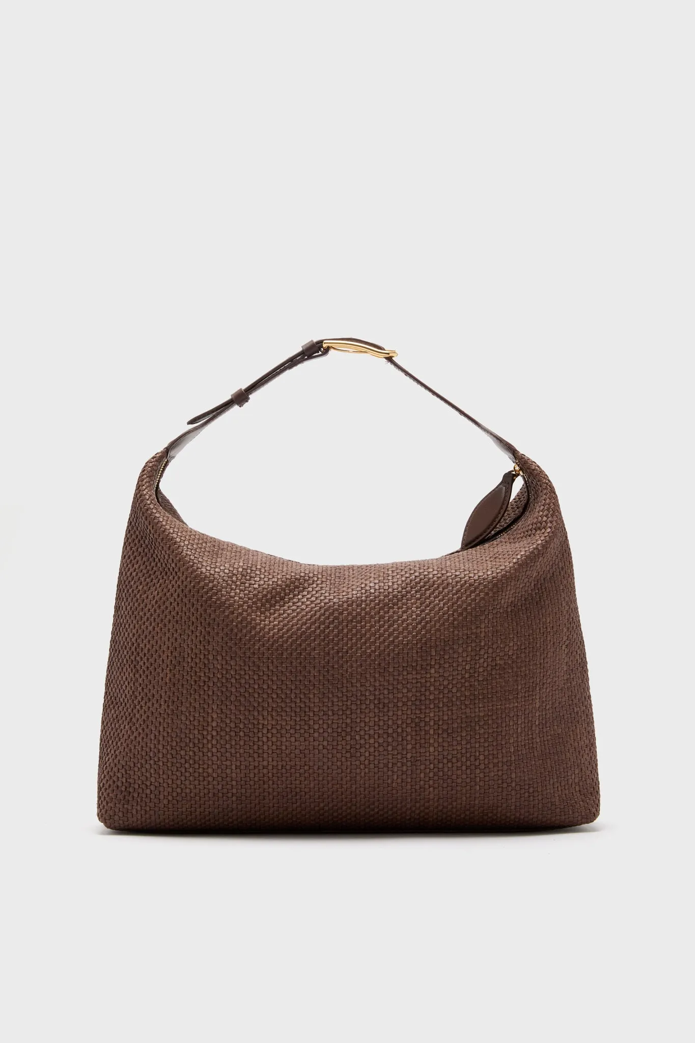 Brown Raffia Pillow Shoulder Bag sold by Tuckernuck