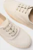 Ivory Canvas Bea Sneakers sold by Tuckernuck