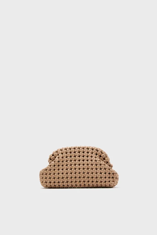 Natural Everly Handwoven Clutch sold by Tuckernuck