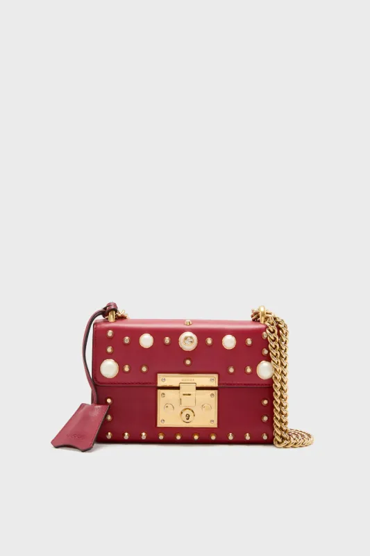 Gucci Red Pearl Studded Padlock Shoulder Bag sold by Tuckernuck