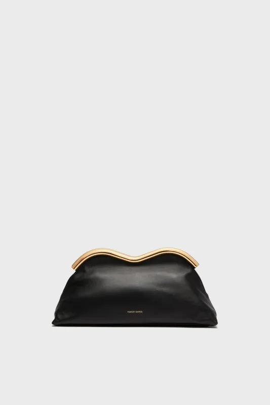 Black and Flamma Baci Clutch sold by Tuckernuck