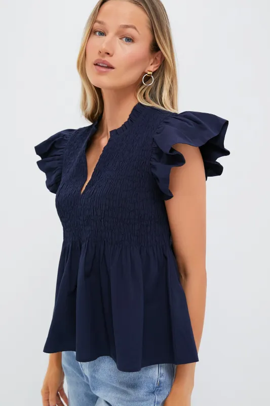 Navy Flutter Sleeve Smocked Irma Top sold by Tuckernuck