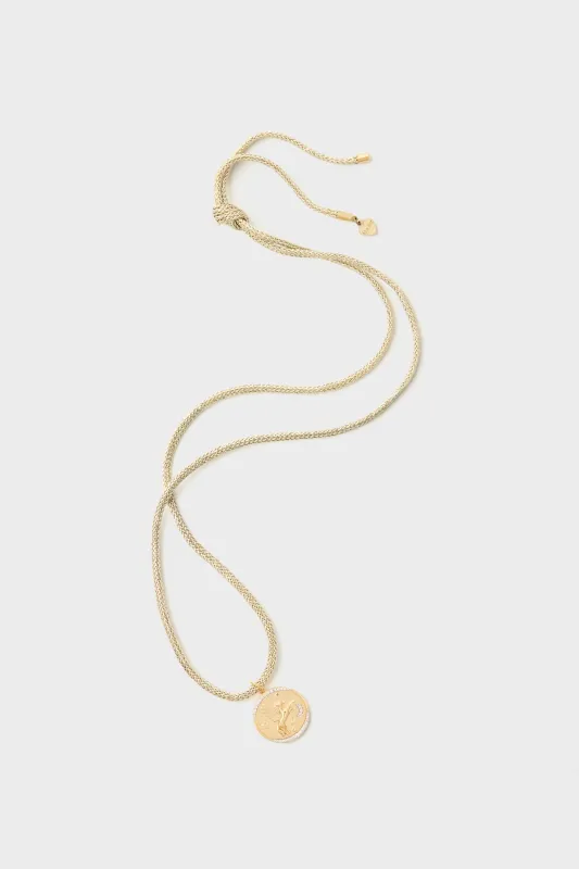 Gold Lurex Cord Necklace with Cosmic Cowgirl Charm sold by Tuckernuck