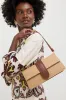 Natural Tan Violet Straw Crossbody sold by Tuckernuck