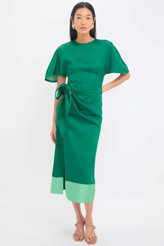 Emerald Slash and Slit Dress sold by Tuckernuck