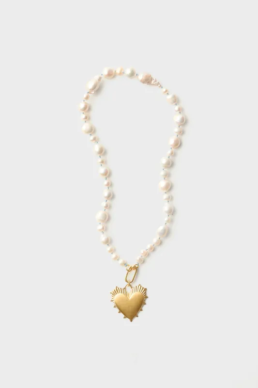 Baroque Pearl Necklace with Heart of Gold Charm sold by Tuckernuck