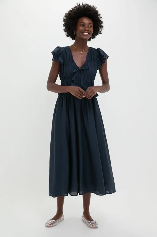 Navy Flutter Sleeve Tie Front Midi Dress sold by Tuckernuck