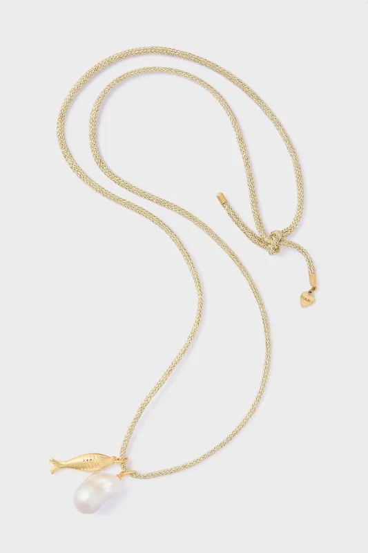 Gold Lurex Cord Necklace with Baroque Pearl and Gold Fish Charms sold by Tuckernuck