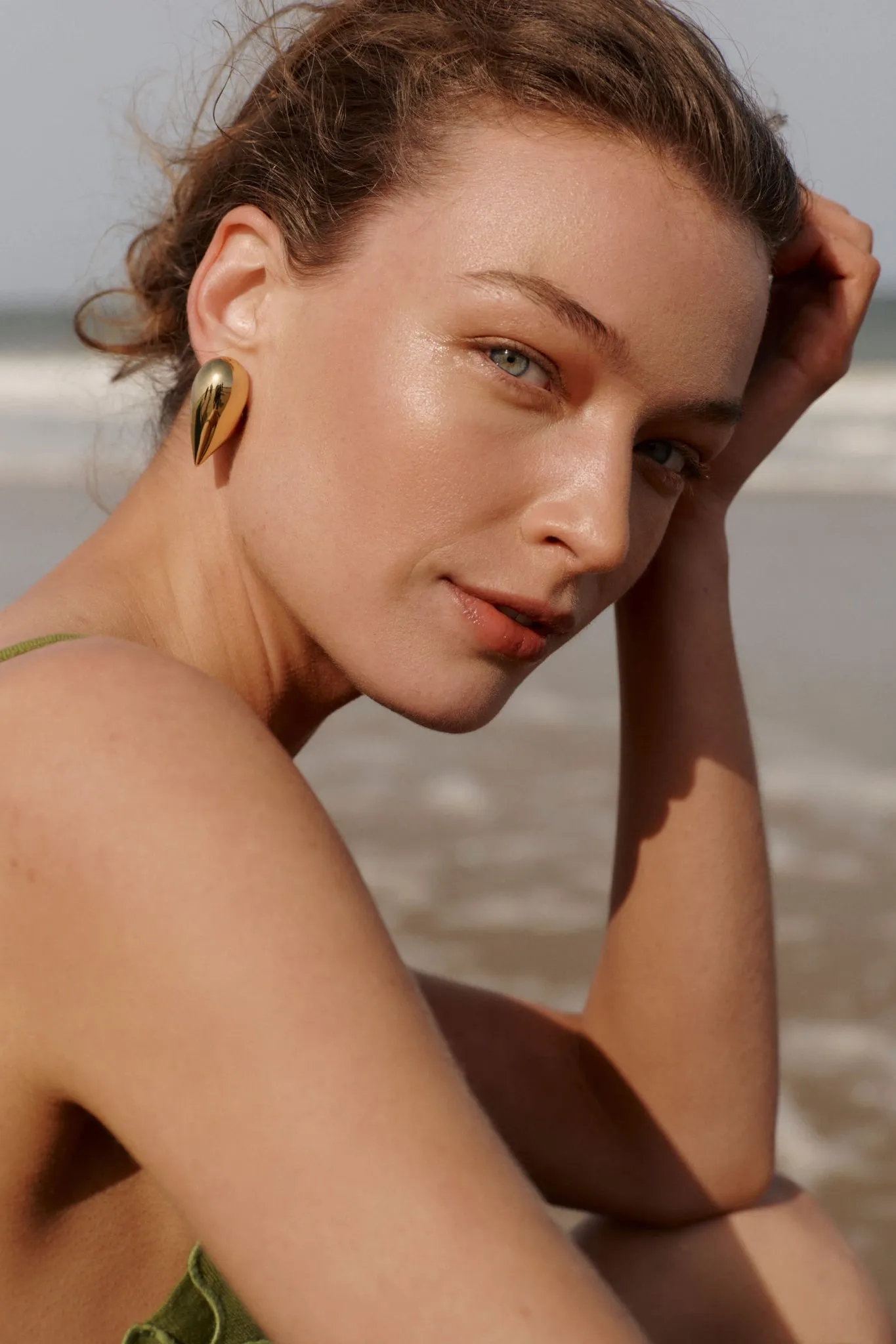 High Polish Gold Art Heart Earrings sold by Tuckernuck product image thumbnail 2